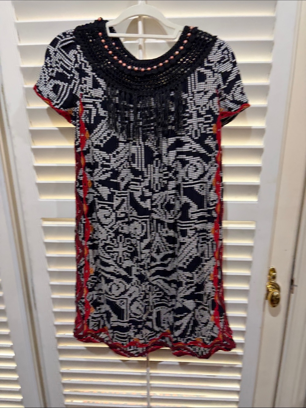 Fringe-Trim Knit Shift Dress in Black and White with Red Accents.Size small